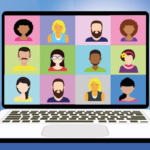 A laptop with users on screen